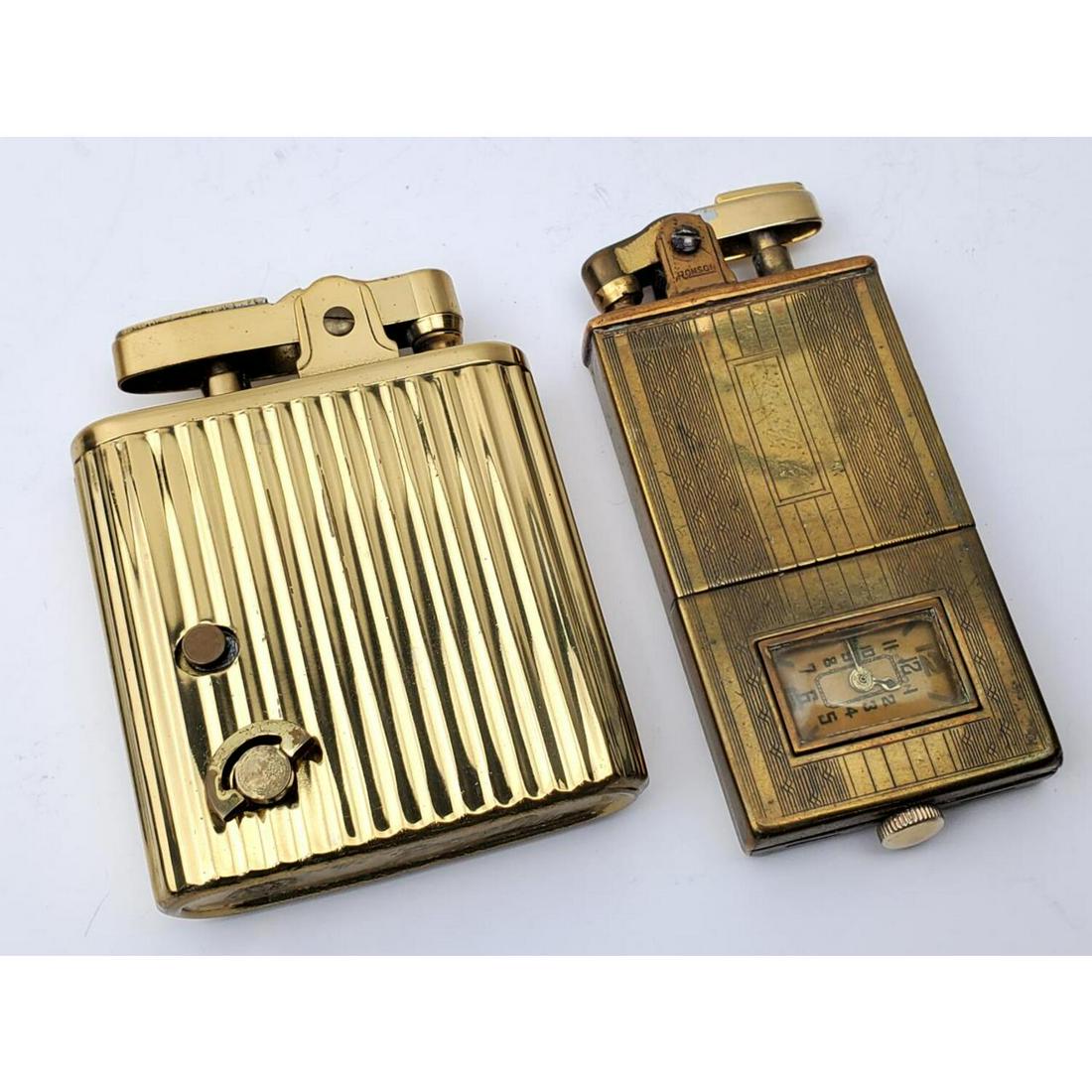 Unusual Vintage Musical Lighter Along w/ Another: Rare and Unusual Vintage Musical Lighter Along with a Ronson Clock/Watch Lighter. Condition: Generally Good. As IS. Ronson Lighter is Monogrammed. Dimensions: Provenance: From a Long Island, NY Home. 