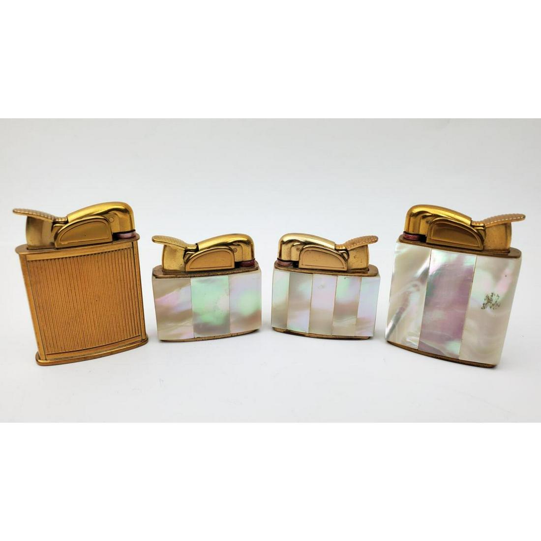 4 Vintage Mother of Pearl Lighters: 4 Vintage Mother of Pearl Lighters. Condition: Generally Good. As Is. Dimensions: Provenance: From a Long Island, NY Home. Please note the absence of a condition report does not imply that there are n