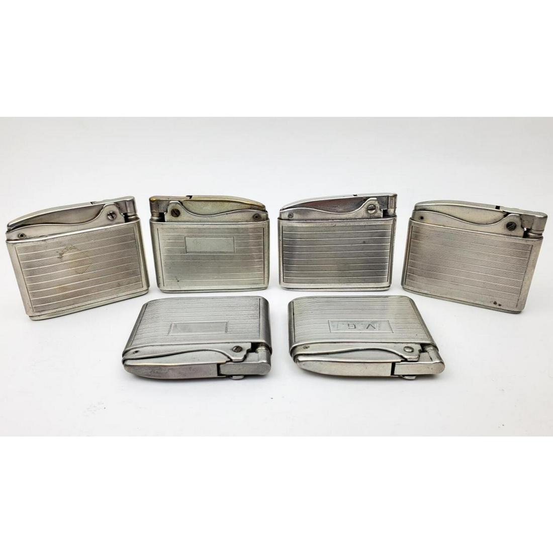 6 Vintage Ronson "Adonis" Cigarette Lighters: Lot of 6 Vintage Ronson "Adonis" Cigarette Lighters. Condition: Generally Good. As Is. 3 are Monogrammed. Dimensions: 1.75" x 2". Provenance: From an Estate of a Collector in Long Island, NY.Please no