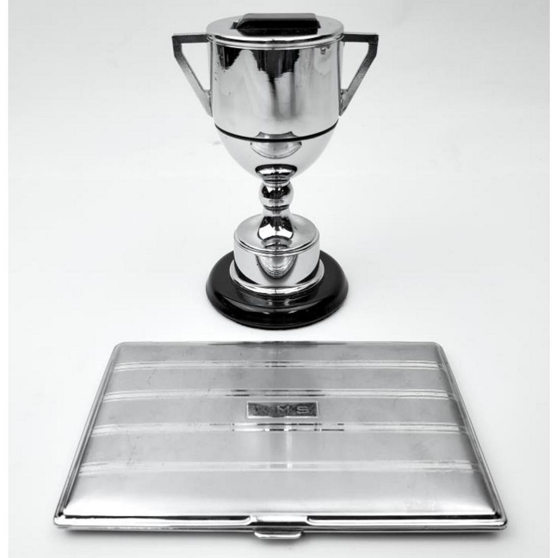 Vintage Parker "Trophy" Chrome Table Lighter: Vintage Parker "Trophy" Chrome Table Lighter Along with with a Ronson Cigarette Case. Condition: Generally Good. As Is. Cigarette Case is Monogrammed. Dimensions: Lighter H- 4.5", Case- 5" x 3.25". Pr