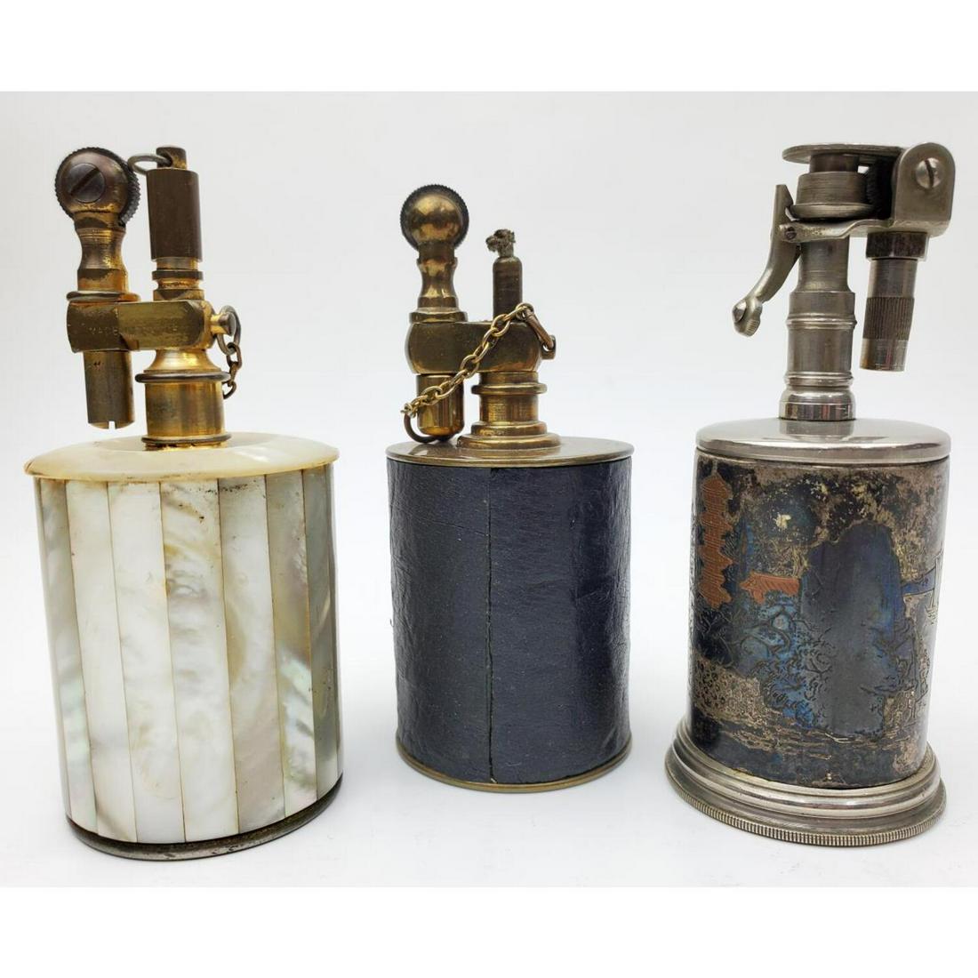 Vintage Mother of Pearl Table Lighter: Vintage Mother of Pearl Table Lighter Along with 2 Others. Condition: Generally Good. As Is. Dimensions: H- 3.5", Dia- 1.5". Provenance: From an Estate of a Collector in Long Island, NYPlease note the