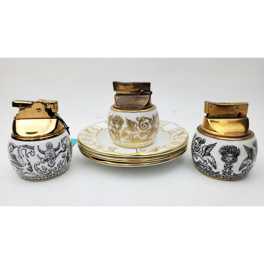 3 Vintage Wedgewood Florentine Lighters: 3 Vintage Wedgewood Black and Gold Florentine Lighters with Ashtrays. Condition: Generally Very Good. Dimensions: H- 2.4", Dia- 2", Ashtray Dia- 4.5". Provenance: From an Estate of a Collector in Long