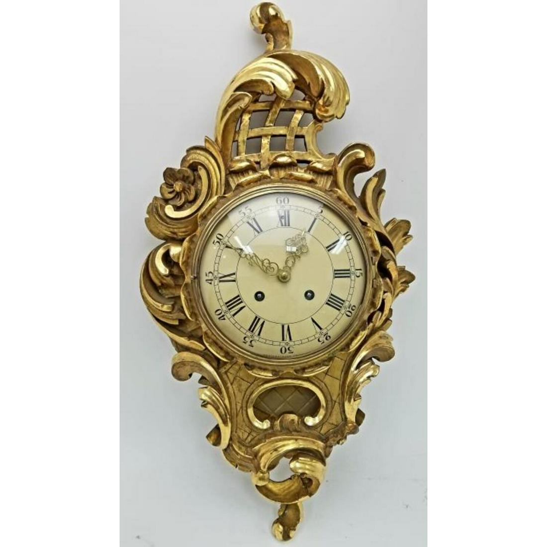 Exceptional Antique Gilt Carved Wood Cartel Clock: Exceptional Antique Gilt Carved Wood Wall CartelClock. Movement by Westerstrand Toreboda. Condition: Generally Good Condition. Some Losses to the Gilt Wood. Please Note: We Cannot Guarantee the Workab