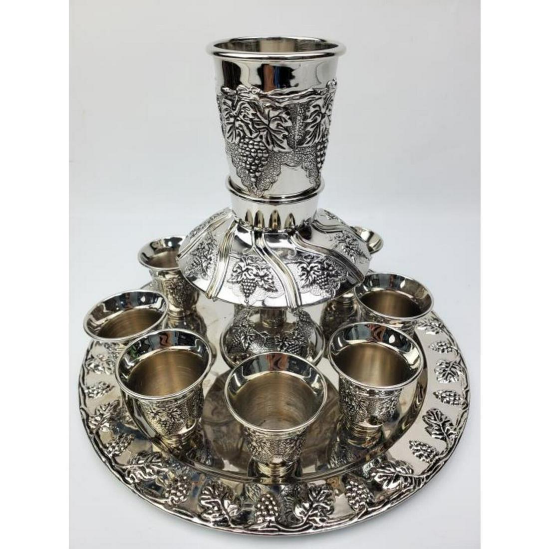 Judaica 11 Piece Kiddish Cup Set: Judaica 11 Piece Kiddish Cup Set. Condition: Excellent. Dimensions: Tallest- 7.25", Dia- 9.75". Provenance: From a Long Island, NY Home. Please note the absence of a Condition Report does not imply th