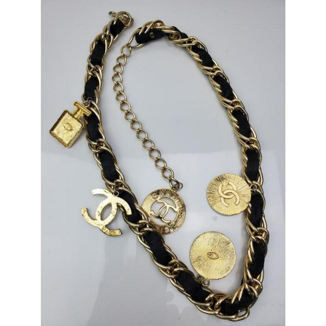 Vintage Chanel Paris Leather and Metal Belt: Vintage Chanel Paris Made in France Leather and Metal Belt. Condition: Generally Very Good. Dimensions: L- 41". Provenance: From a Long Island, NY Home. Please note the absence of a Condition Report d