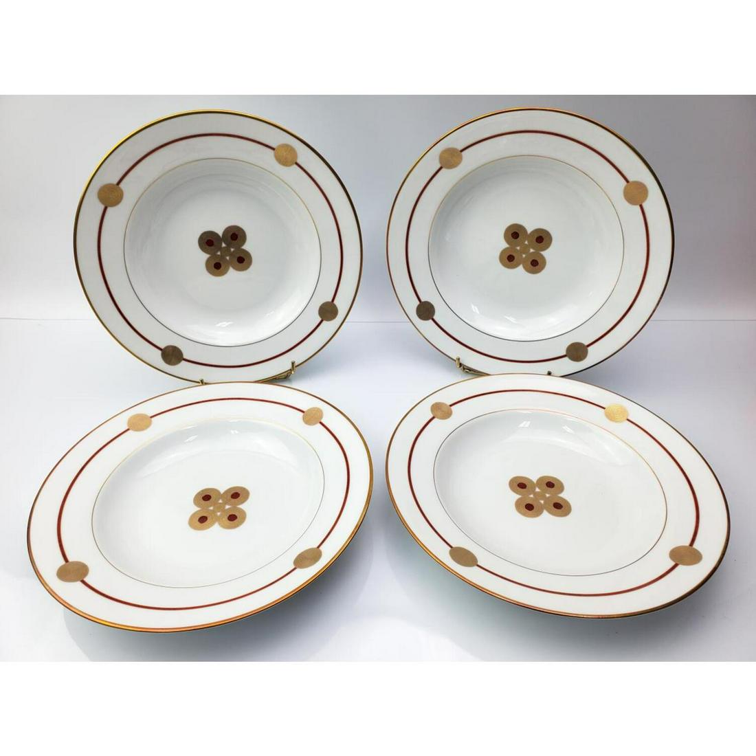 5 Piece Limoge France "Ebotan" Porcelain set: 4 Piece Limoge France "Ebotan" Porcelain Lot of Soup Plates in Original Fitted Box. All Fully Signed.Condition: Excellent.Dimensions: Size of Box 10.75" 10.75", H- 4".Provenance: From a Long Island, N