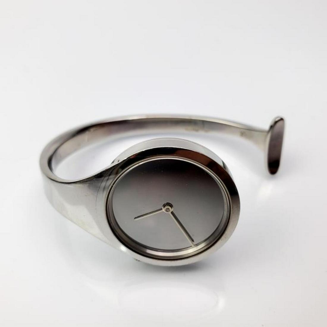 Georg Jensen Denmark "Vivianne" Modernistic Watch: Georg Jensen Denmark "Vivianne" Modernistic Watch.Condition: Generally Very Good. However, we cannot guarantee the functionality of the mechanism of any watches.Dimensions: Dia of face- 1", Dia of Bra