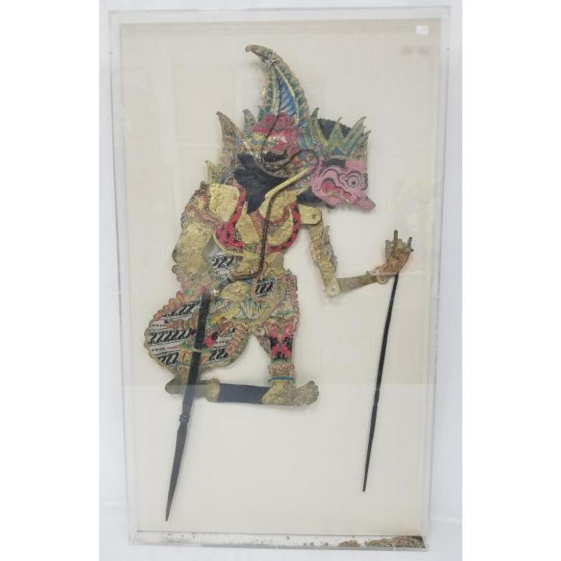 Balinese Antique Winged Devil Puppet: Balinese Antique Winged Devil Puppet In a Plexiglas Frame. Not Examined Out of Frame. Condition: As Is with Losses Due to Age. Dimensions: 33" x 18", Frame- 36.5" x 21.5". Provenance: From a Long isla