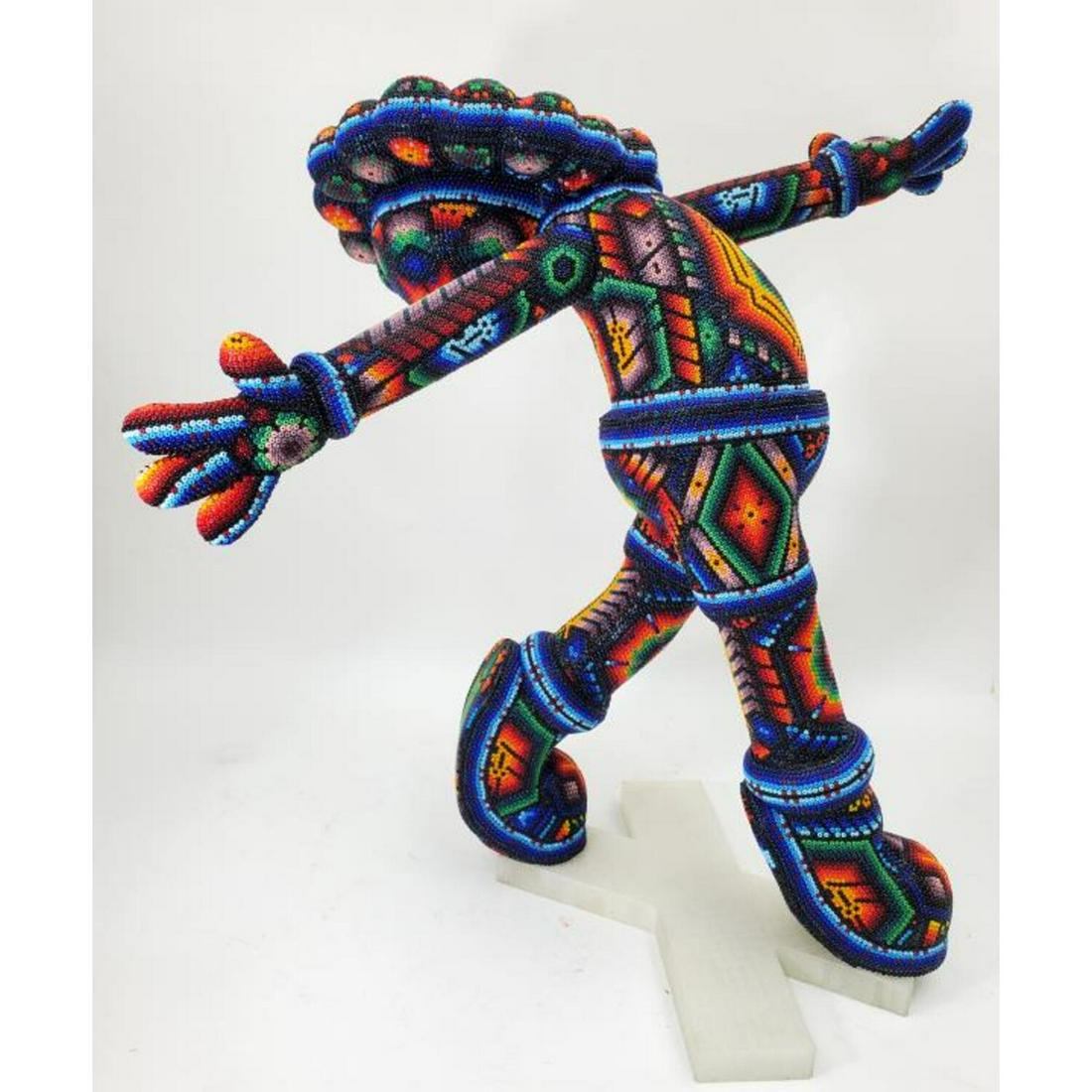 Rick Wolfryd (CHROMA) America-Mexican (Born 1953): Rick Wolfryd (CHROMA) America-Mexican (Born 1953) Color Bead Vinyl Sculpture Bobble Head in Huichol Style. "Express Yourself". Signed and Dated at the Bottom. Condition: Excellent. Dimensions: H- 15",