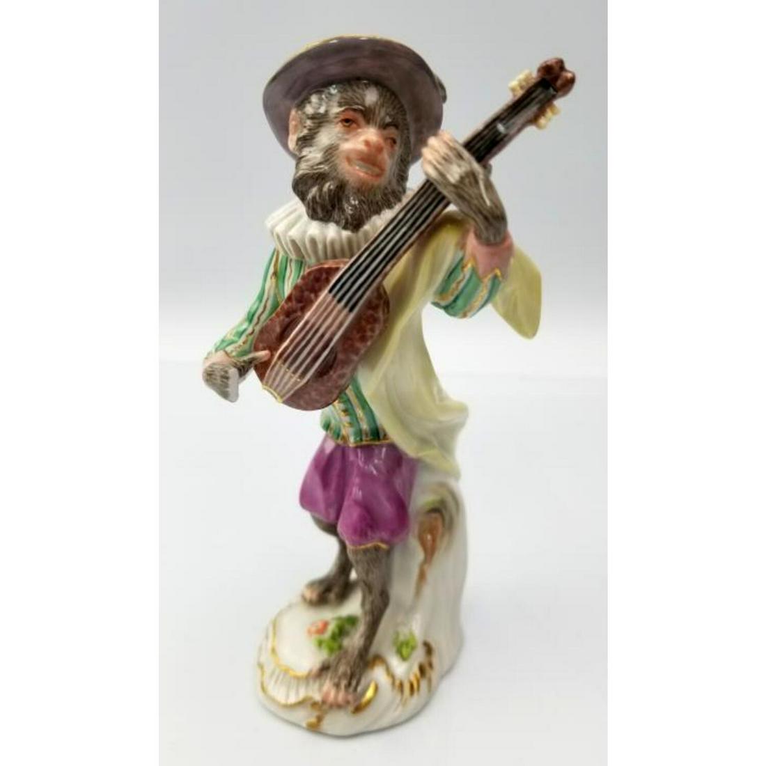 Meissen Monkey Band Guitar Player: Meissen Monkey Band Guitar Player. Condition: Generally Good. Fingers are Broken but Available. Dimensions: H- 5.5".Provenance: From a New Jersey Home.Please note the absence of a Condition Report doe