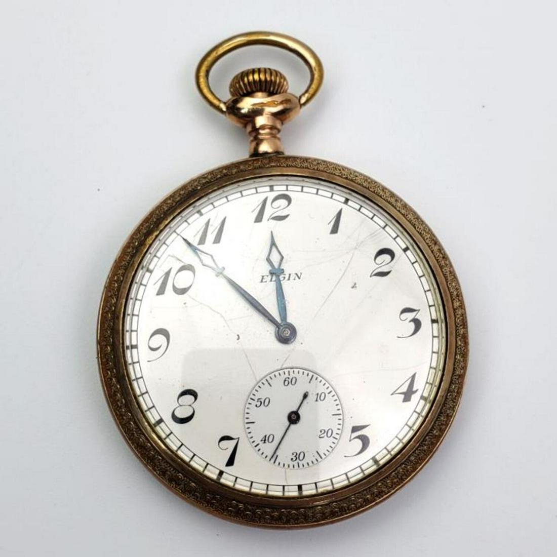Antique Elgin Pocket Watch with Enameled Face: Antique Elgin Pocket Watch with Enameled Face. Fully Marked and Numbered 25052617. Condition: Generally Good, Some Chips and Cracks on the Enamel Face. Not is Working Condition. Please Note: We Cannot