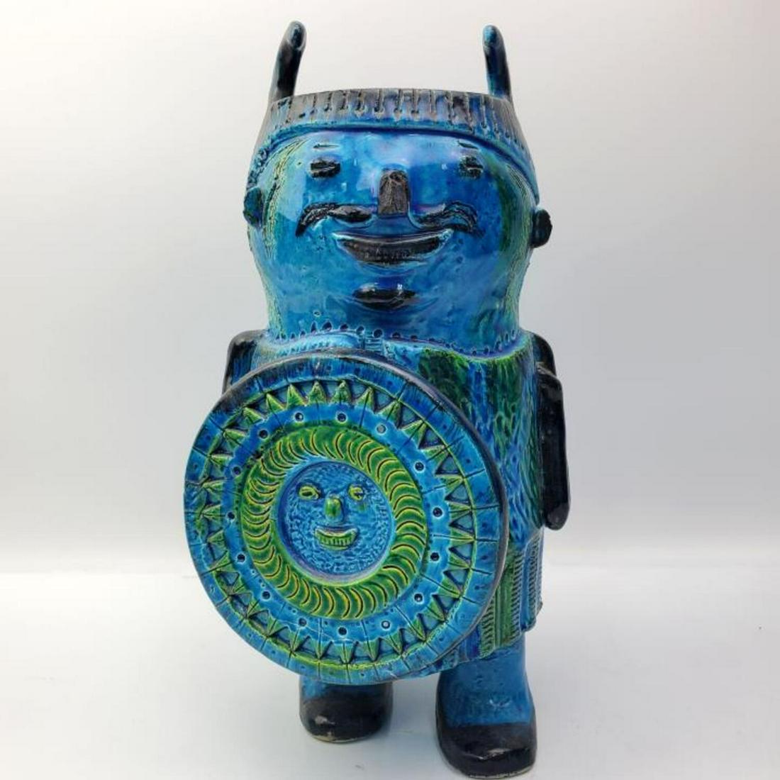 MCM Bitossi, Italy Pottery Vase.: MCM Bitossi, Italy Pottery Vase w/ Green, Black & Blue Glaze. Numbered at the Bottom 5053B & Italy.Condition: The Front Shield Has Been Repaired. There Are Some Chips Including the Nose of the Figure.