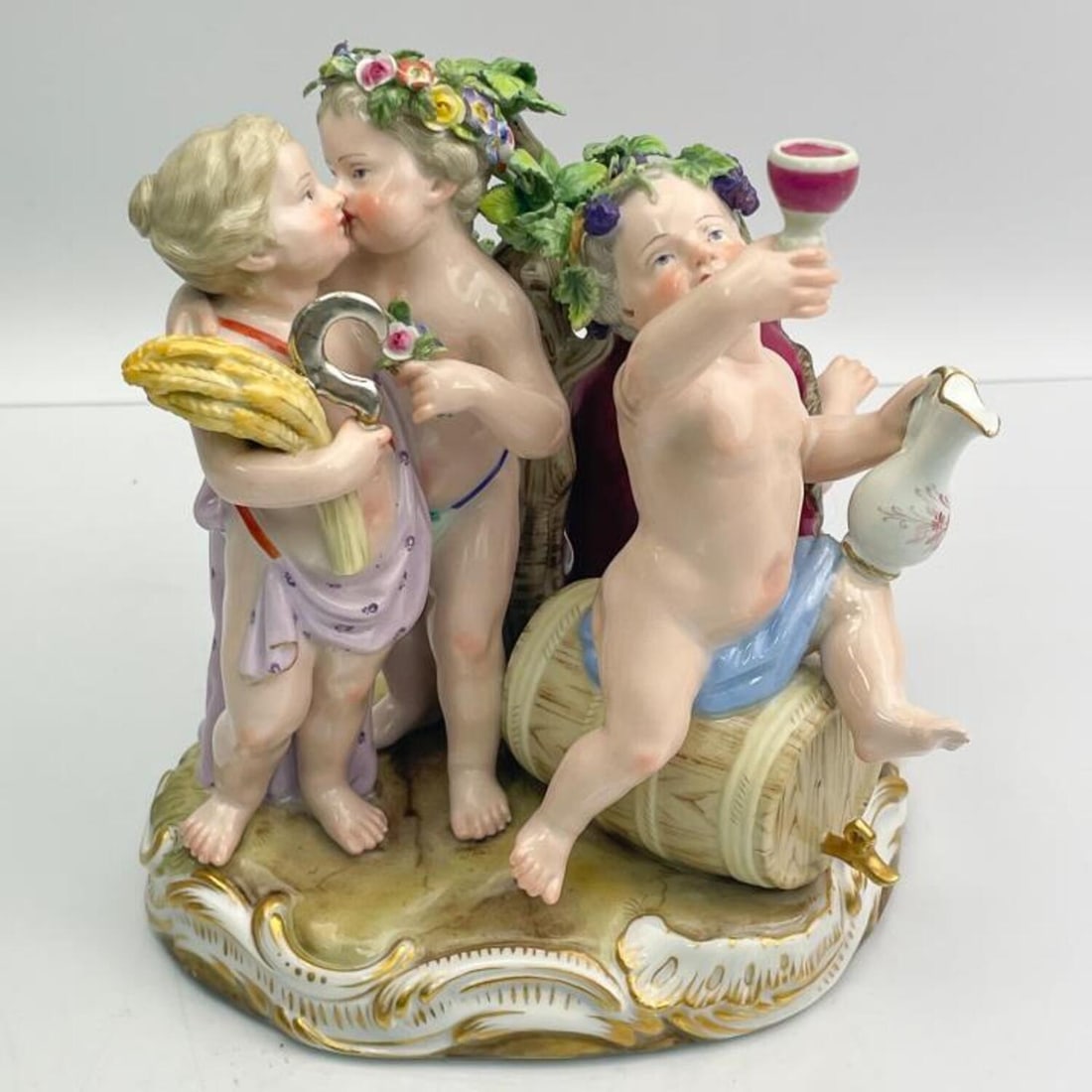 Antique 19th Century Meissen Figure "Autumn" Child: Antique 19th Century Meissen Figure "Autumn" Depicting 4 Children Harvesting and Making Wine. Condition: Generally Very Good. Dimensions: L- 5.75" x W- 4.25" x H- 5.75". Provenance: From a New Jersey 