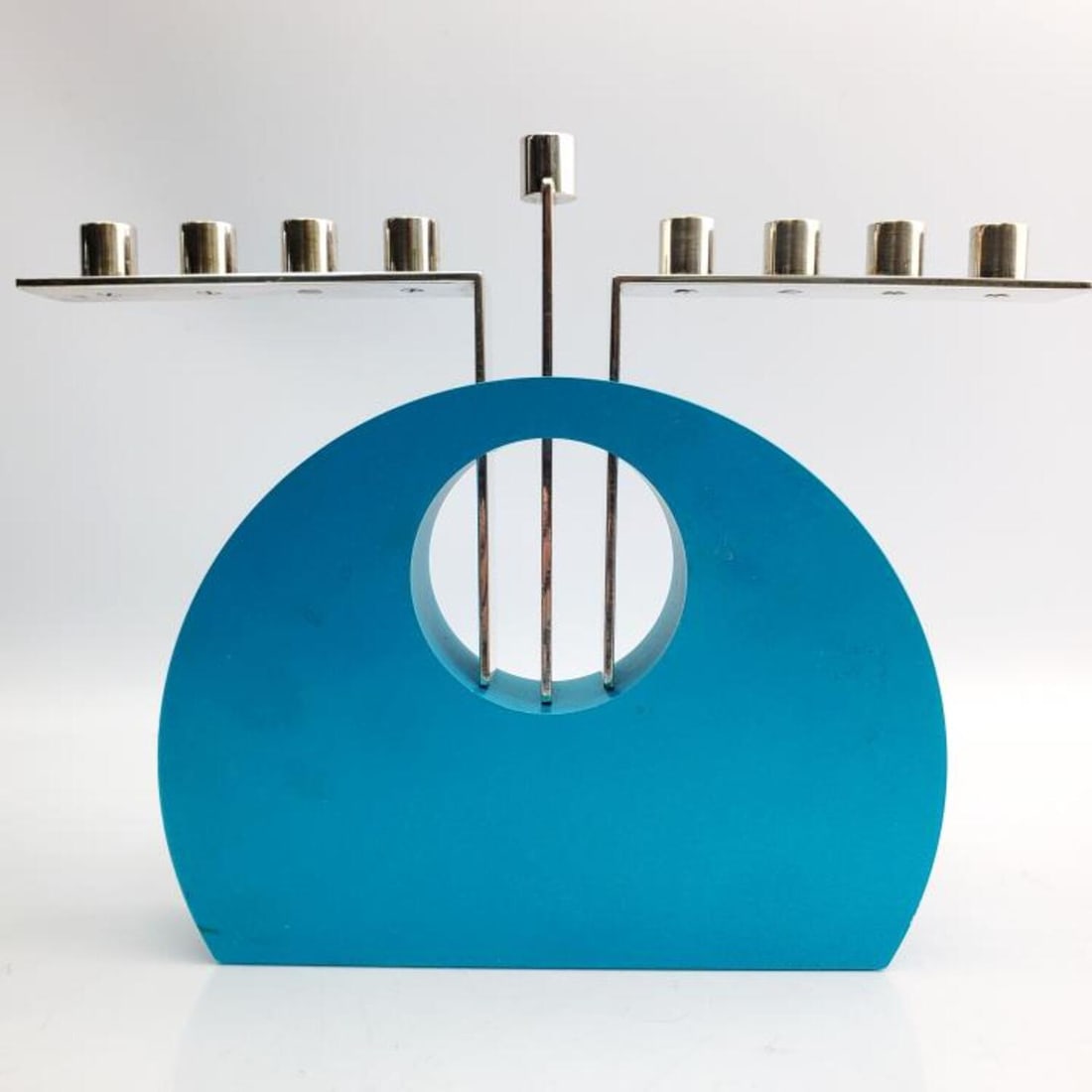 Judaica Rafi Landau Limited Edition Menorah: Limited Edition Unusual Judaica Aluminum & Metal Menorah by Rafi Landau. Fully Signed & Numbered 34/300.Condition: Generally Very Good.Dimensions: L-10.75 x H-8.5".Provenance: From a Long Island, NY H