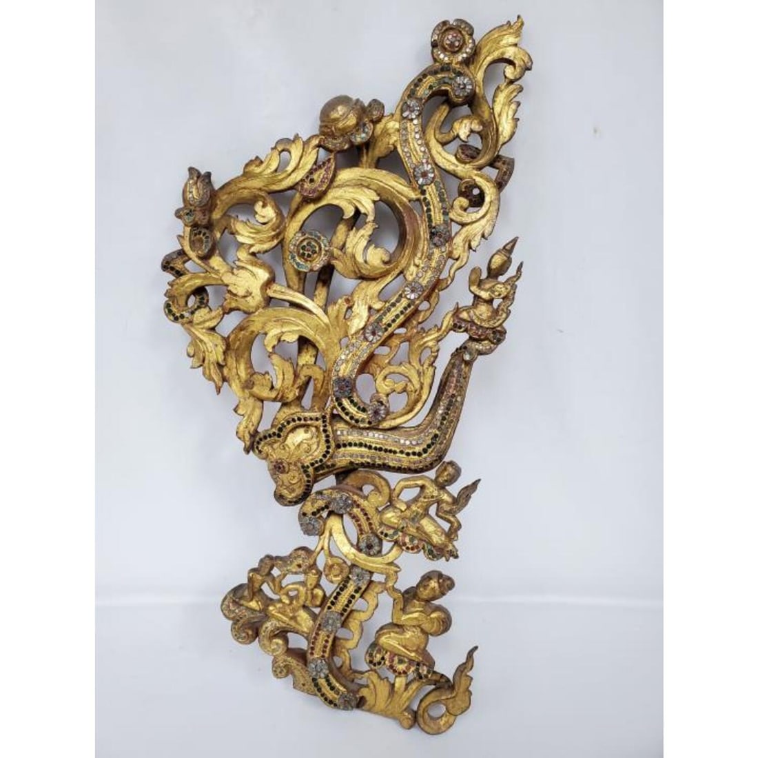 Antique Thai Gilt Carved Wood Wall Decoration: Antique Thai Gilt Carved Wood Wall Decoration w/ Colored Stones. Condition: Generally Good As Found.Dimensions: H-29.5" x W-15".Provenance: From a Private New Jersey Collector. Please note the absence