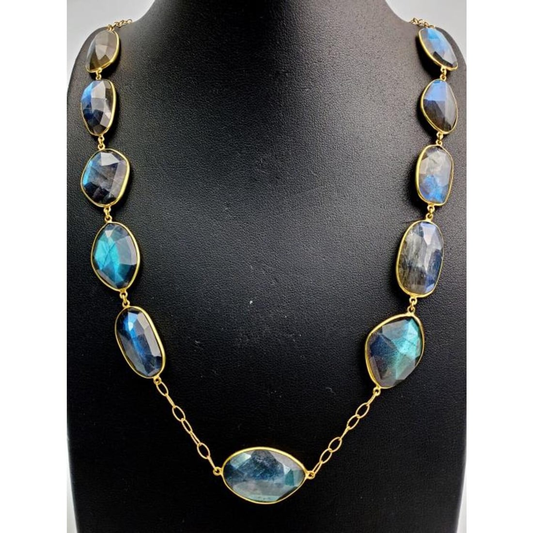 18K Gold and Labradorites Long Necklace w/ 19 Gems: 18K Gold and Labradorites Long Necklace with 19 Faceted Labradorite Blue Gemstones. Condition: Excellent. Dimensions: L- 36". Total Weight: 48.8 g. Provenance: From a Long Island, NY Home. Please note