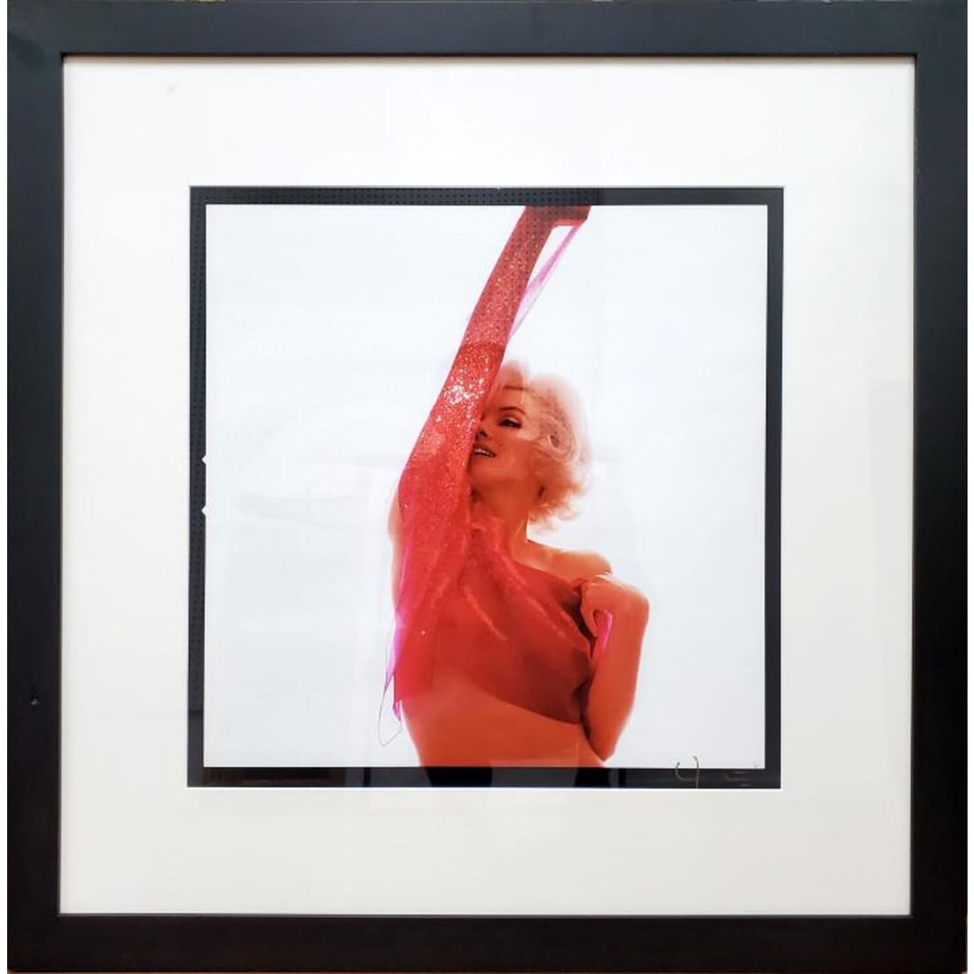 Bert Stern, American (1929 - 2013) Signed Print: Attributed to Bert Stern, American (1929 - 2013) Print of "Marilyn Monroe in Red". Signed Lower Right . Dated 2012 on the Back w/ Copyright Stamp. Framed Under Glass. Has Not Been Examined Out of Fram