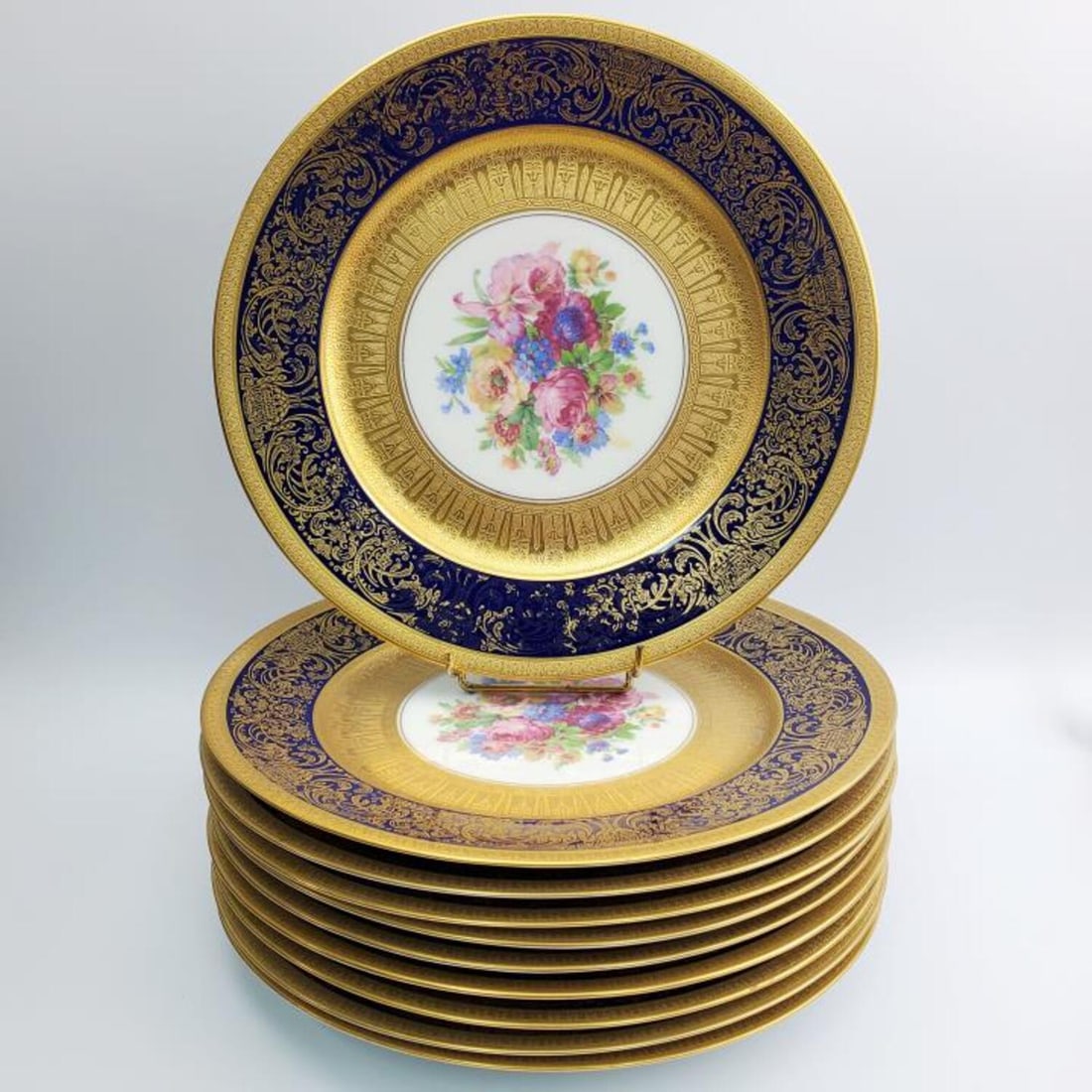 10 Hand Painted and Gilt Ovington's Service Plates: Set of 10 Hand Painted and Gilt Ovington's Porcelain Service Plates. Condition: Generally Very Good. Minor Gilt Loss. Dimensions: Each D- 10 3/4". Provenance: From a Queens, NY Home. Please note the a