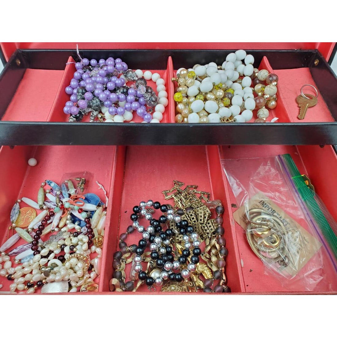 Large Lot of Costume Jewelry in Vintage Box: Large Lot of Costume Jewelry, Including Some by Monet. In a Vintage Jewelry Box. Condition: Generally Good. Dimension: Box L-13.5" x W-8.5" x H-3.5". Provenance: From a Long Island Home. Please note t