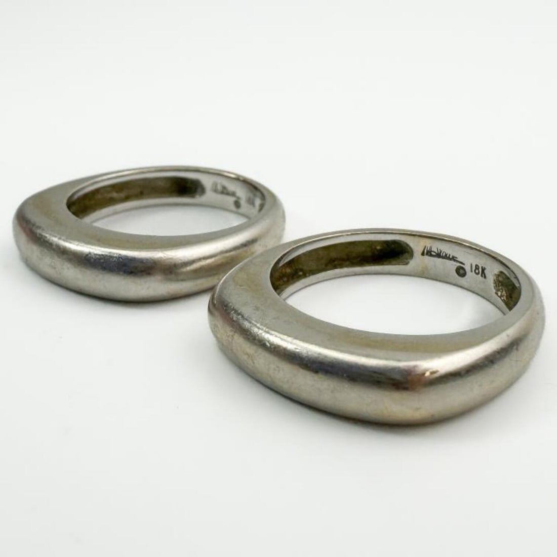 2 Marlene Stowe 18K White Gold Rings: 2 Marlene Stowe 18K White Gold Rings.Condition: Excellent.Dimensions: Both Ring Sizes- 7. Total Weight: 12.6g/.8.2dwt.Provenance: From a Long Island, NY Home.Please note the absence of a Condition Rep
