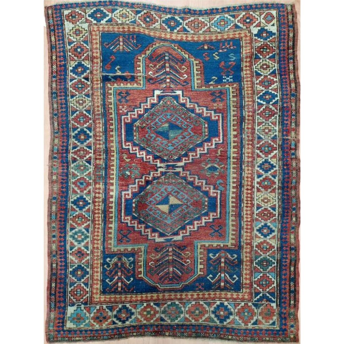 Antique Caucasian Probably Kazak Rug: Antique Caucasian Probably Kazak Rug. Condition: Generally Good with Repairs in Some Areas. Sold As Is.Dimensions: 4' 2" x 6'.Provenance: From a Long Island, NY Home. Please note the absence of a Cond