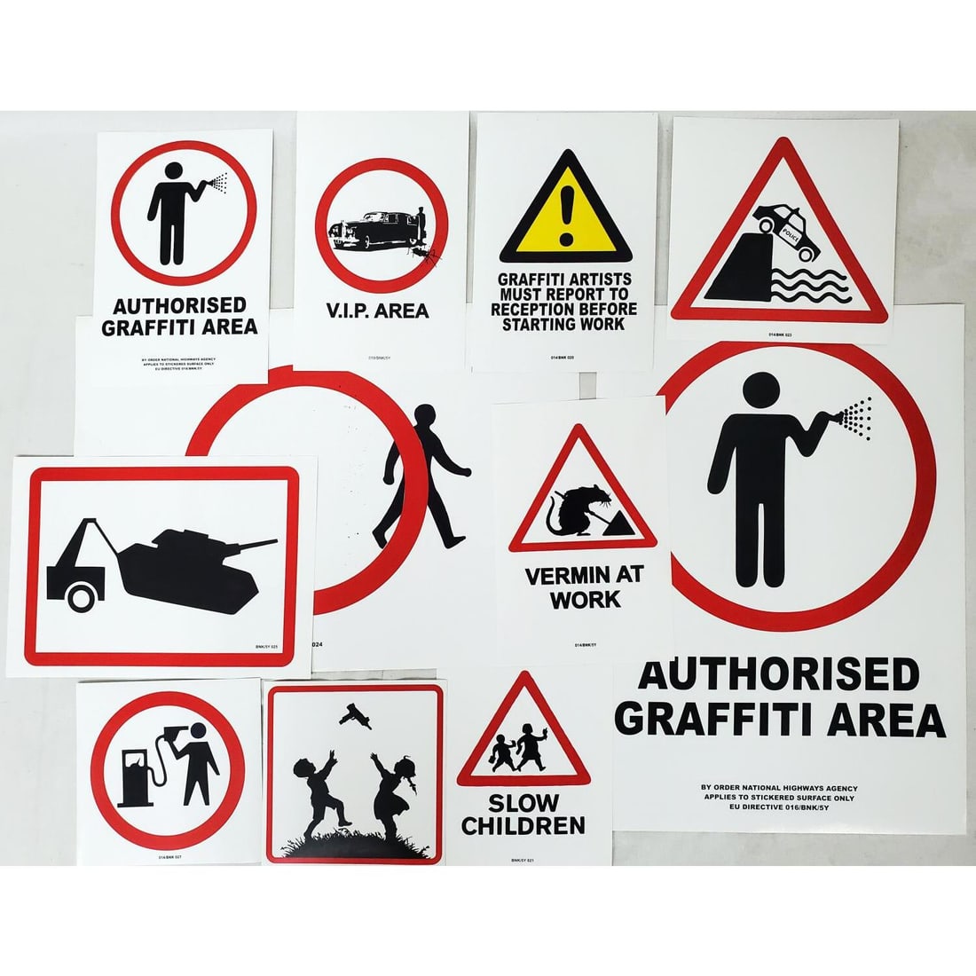 Attributed to Banksy, Lot of 12 Stickers: After & Attributed to Banksy, British, Lot of 12 Stickers Designed by Banksy Including "Petrol Head", "Towing Tank" & "Graffiti Artists Must Report to Reception" & Others. We Do Not Guarantee the Auth