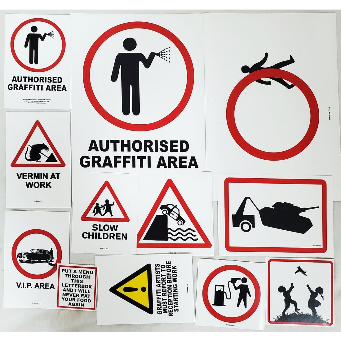 Attributed to Banksy, Lot of 12 Stickers: After & Attributed to Banksy, British, Lot of 12 Stickers Designed by Banksy Including "Petrol Head", "Towing Tank" & "Graffiti Artists Must Report to Reception" & Others. We Do Not Guarantee the Auth