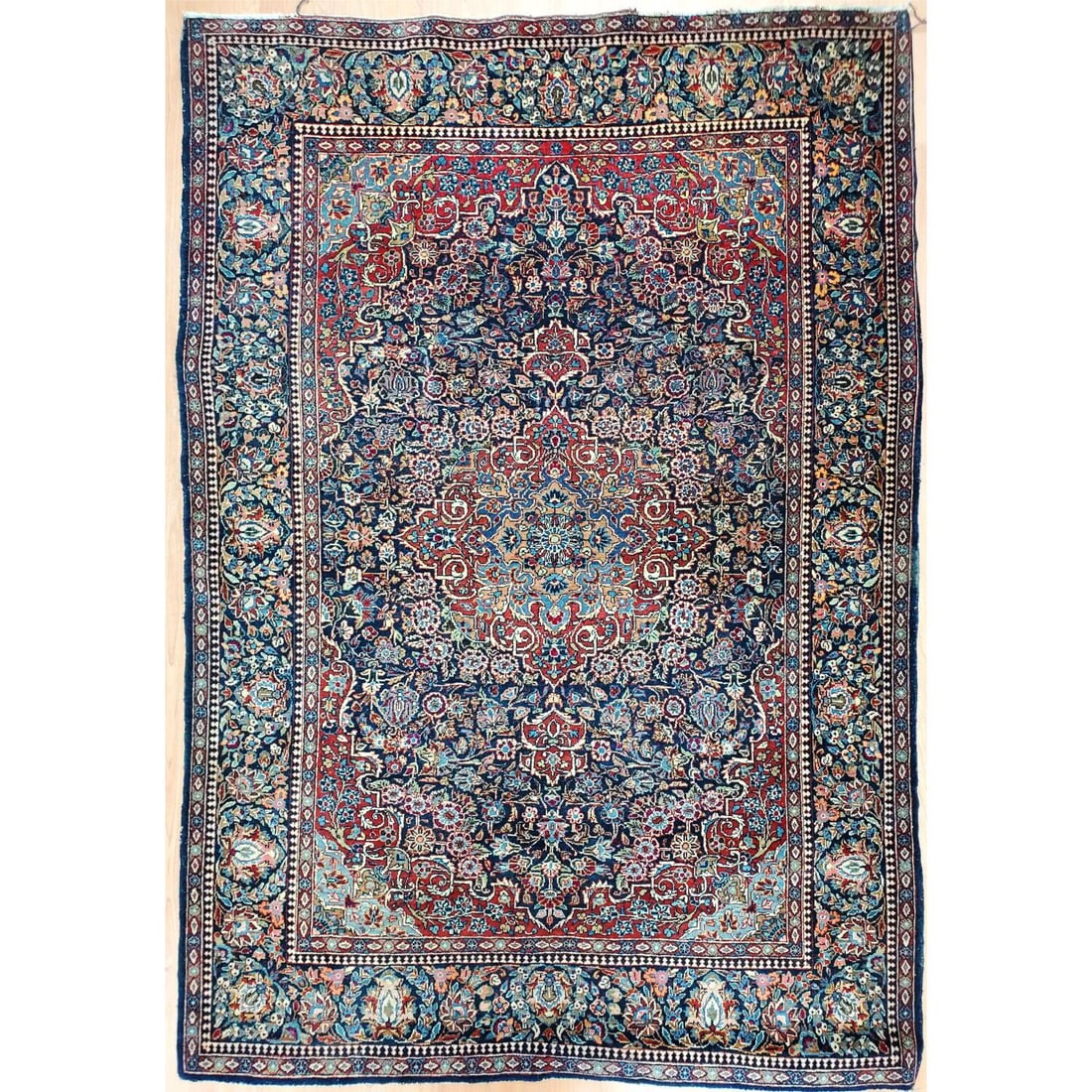 Antique Persian Kashan Rug: Antique Persian Kashan Rug. Condition: Generally Good with Some Fraying to the Edges. Dimensions: L- 77" x W- 55". Provenance: From a New York City Apartment. Please note the absence of a Condition Re