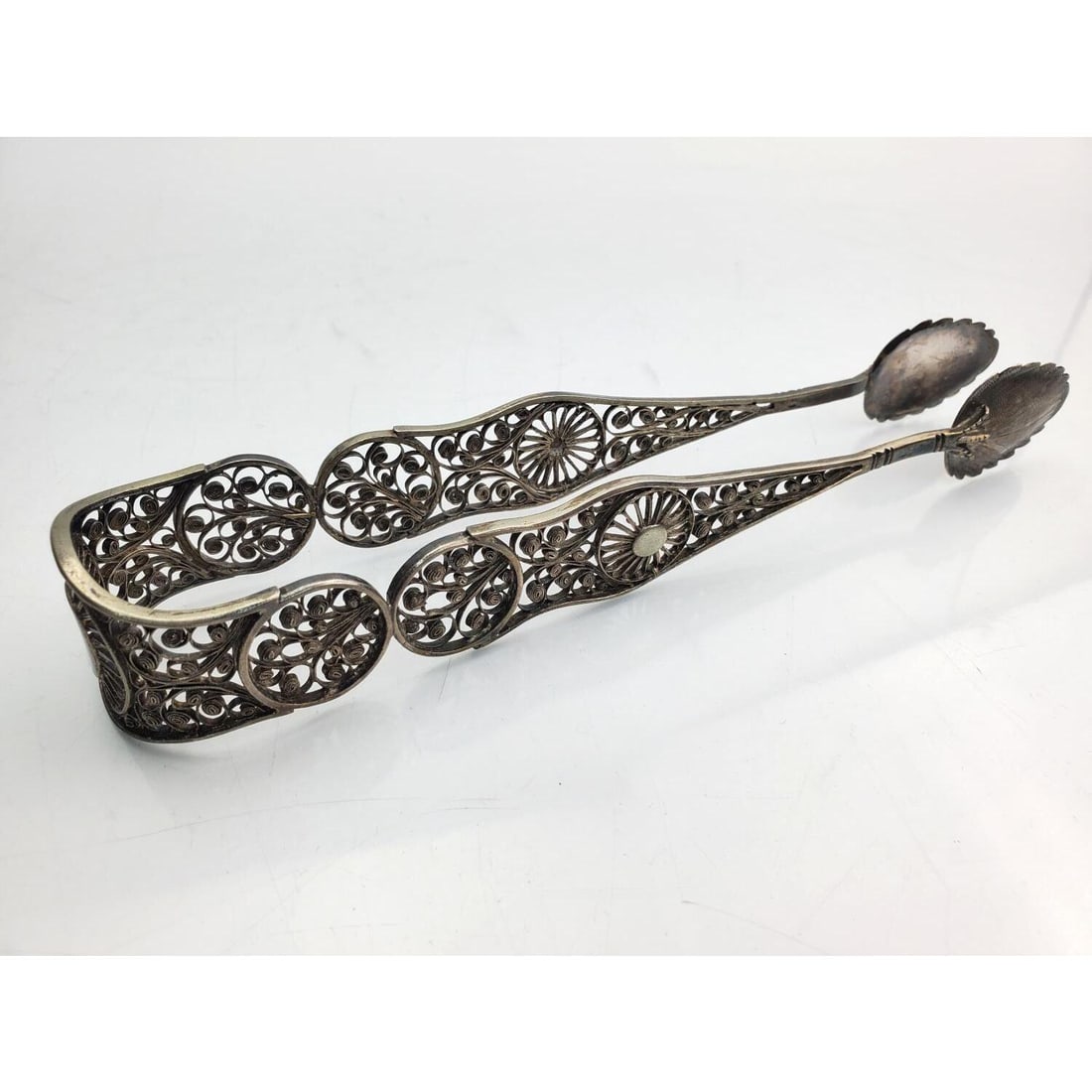 Rare Russian Antique 84 Silver Filigree Tongs: Rare Russian Antique 84 Silver Filigree Decorated Tongs. Fully Hallmarked and Dated 1881. Condition: Generally Very Good. Dimensions: L- 8.75". Total Weight- 78.1g/2.5ozt. Provenance: From a Long Isla