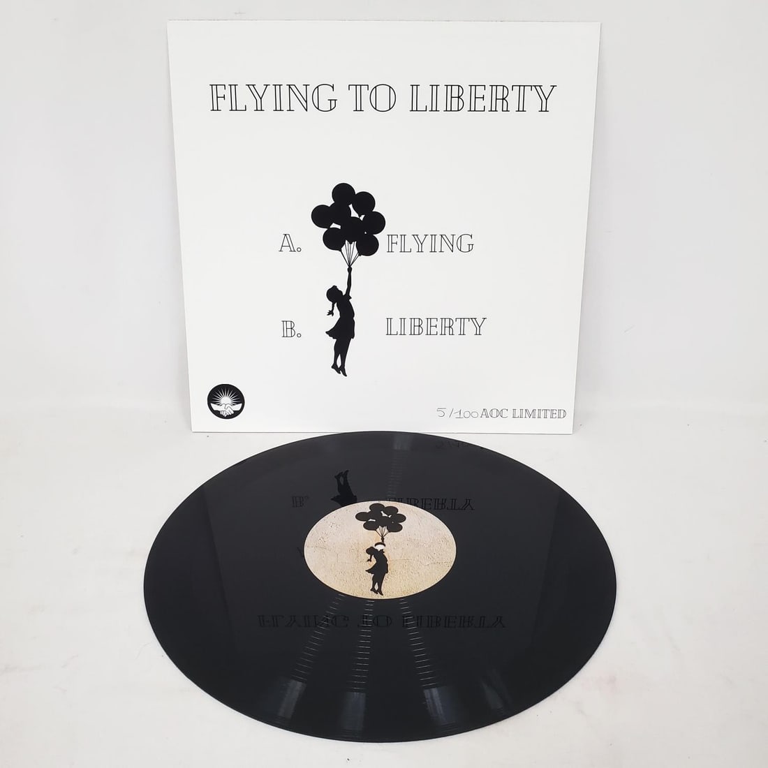 Attrib. to Banksy "Flying to Liberty" Vinyl 5/100 (1 of 3)