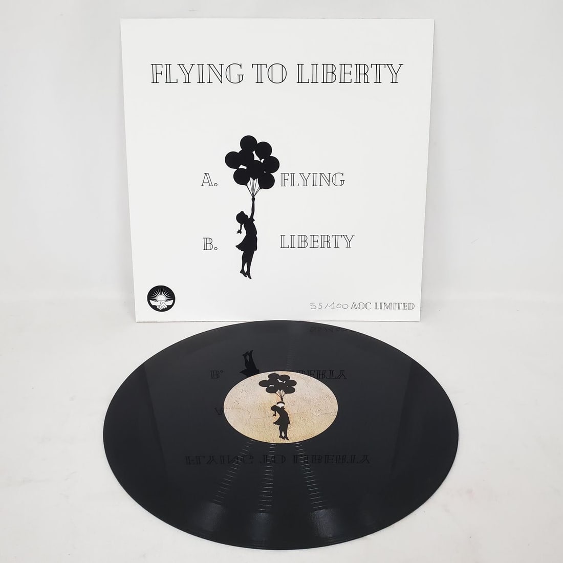 Attrib. to Banksy "Flying to Liberty" Vinyl 55/100 (1 of 3)