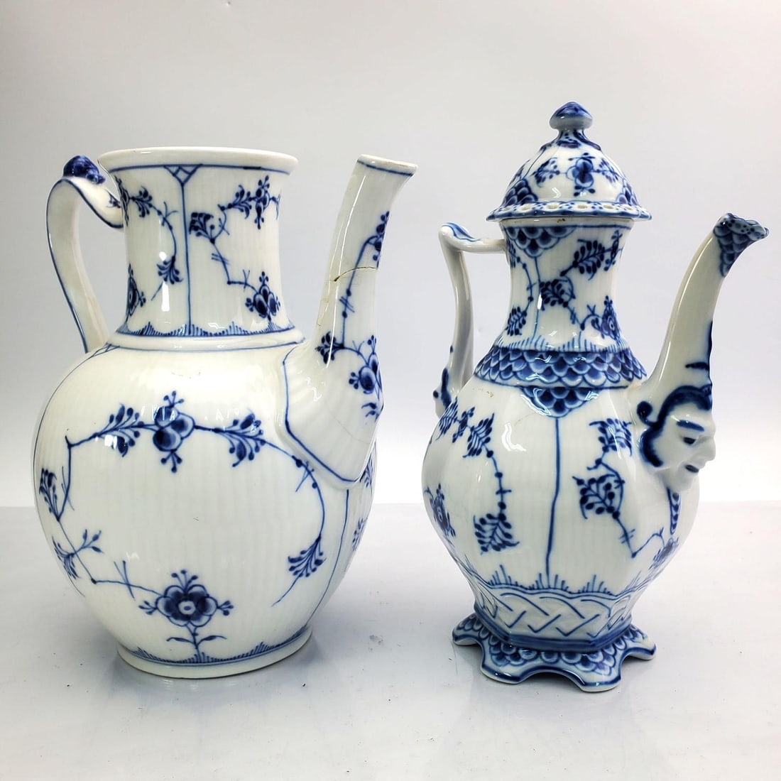 Royal Copenhagen Blue Fluted Full Lace Mocha Pot: Royal Copenhagen Blue Fluted Full Lace Covered Mocha Pot. Model 1030. Fully Marked. Along with Another. Condition: Covered Mocha Pot is Excellent. Other Item is Repaired. Dimensions: Covered Mocha Pot