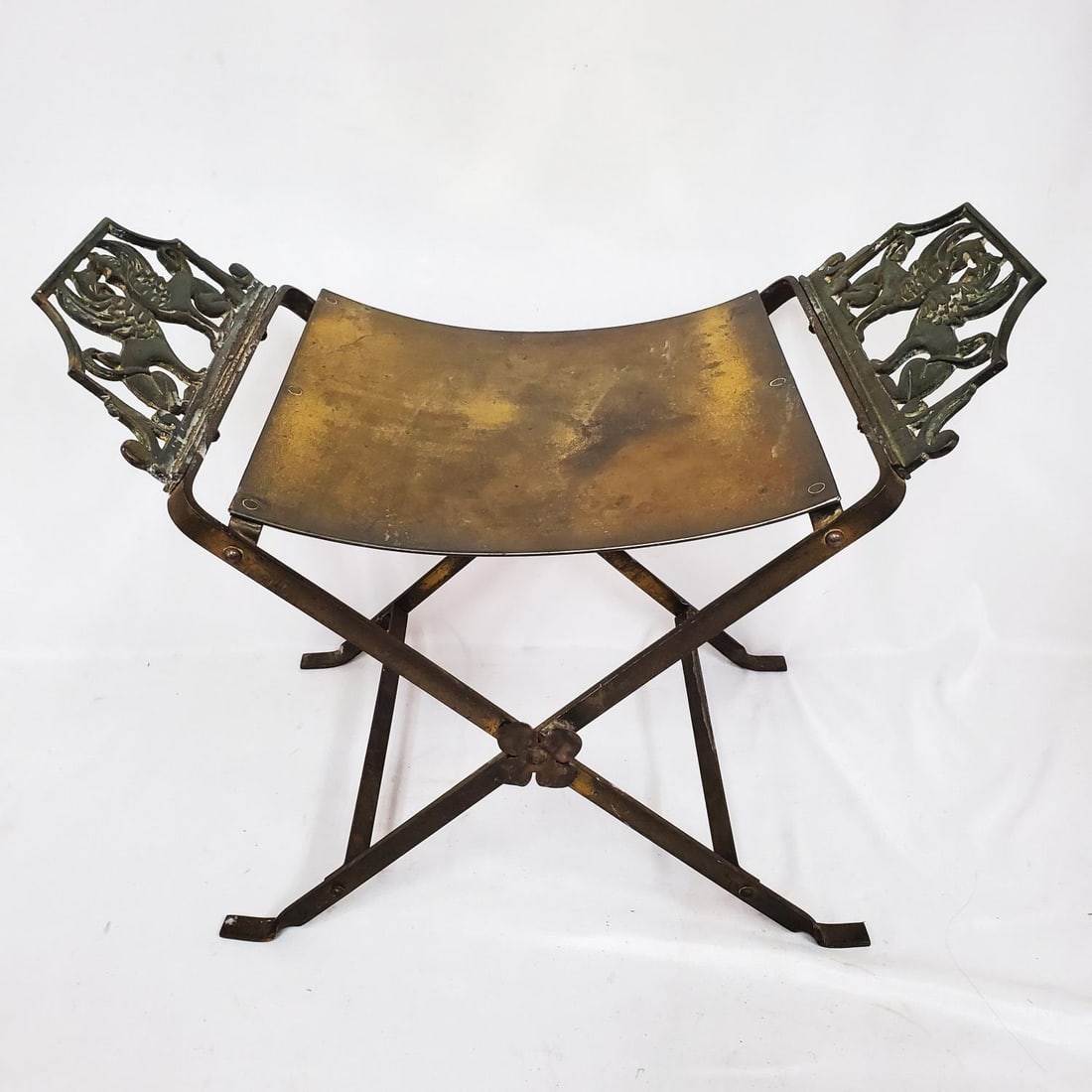Antique Brass Bench w/ Decoration of Gargoyles: Antique Brass Bench w/ Decoration of Gargoyles. Condition: Generally Good. As Found. Dimensions: L-23.75" x W-13.25" x H-19". Provenance: From a Long Island, NY Estate. Please note the absence of a Co