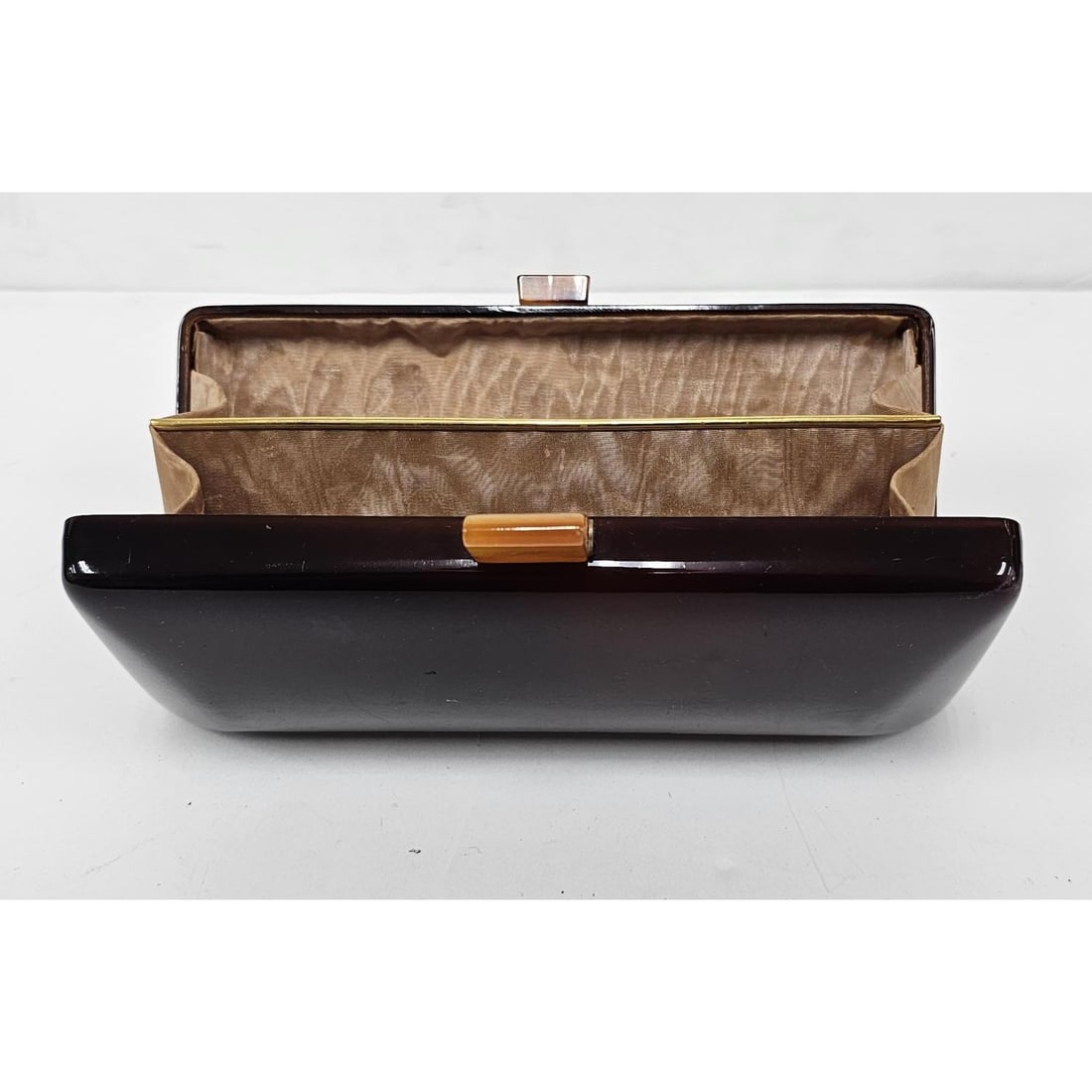 MCM Lucite Lady Clutch Bag: MCM Lucite Lady Clutch Bag. Condition: Generally Good. No Cracks. Some Scratches Due to Use. Dimensions: L-8" x W-4" x H-4". Provenance: From a Long Island, NY Home. Please note the absence of a Condi