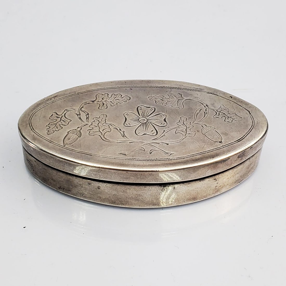 Antique English Sterling Silver Pill Box: Antique English Sterling Silver Pill Box. Fully Hallmarked & w/ Makers Mark. Condition: Generally Good. Dimensions: L-2.8" x W-1.5" x H-0.6". Weight: 49.7g/1.6ozt. Provenance: From a Private New York
