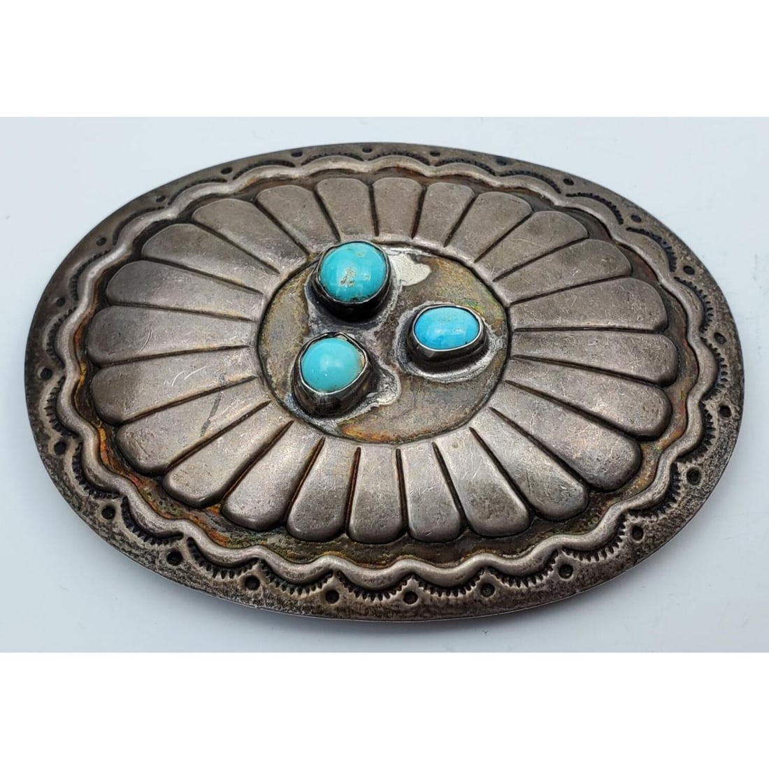 Native American Silver & Turquiose Belt Buckle: Native American Silver and Turquiose Belt Buckle. Condition: Generally Good with Some Tarnishing.Dimension: L- 3" x W- 2.25". Total Weight: 1.13 ozt / 35.1g. Provenance: From a Long Island, NY Home. P