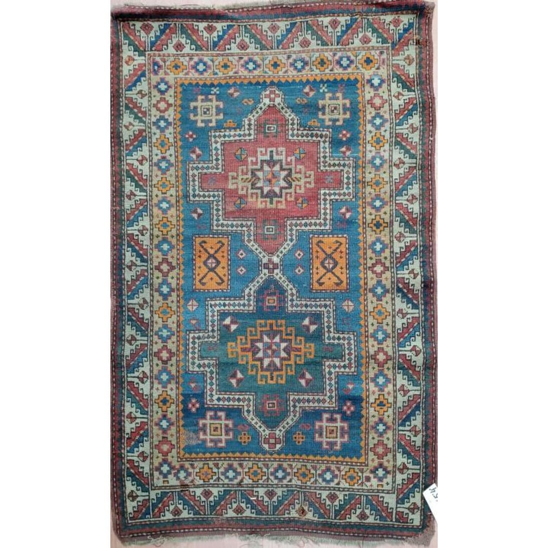 Antique Caucasian Rug: Antique Caucasian Rug. Condition: Generally Good with Wear and Repairs in Some Areas. Sold As Is.Dimensions: 3' x 5' 4".Provenance: From a Long Island, NY Home. Please note the absence of a Condition 