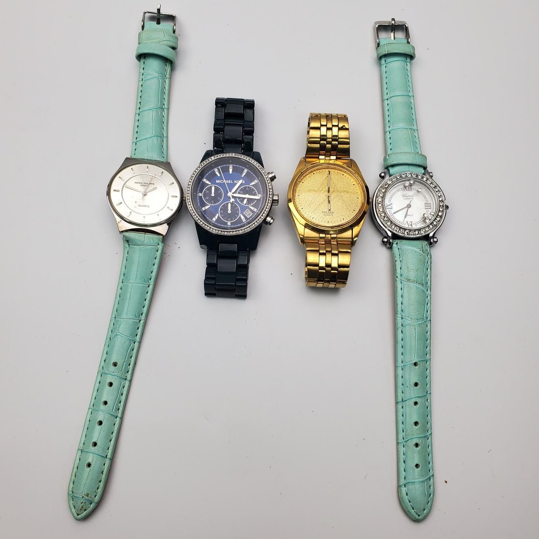 Lot of 4 Watches: Lot of 4 Watches. 2 Are Authentic. 2 Are NOT AUTHENTIC. Condition: Generally Good, However, We Do Not Guarantee the Workability or Mechanism of Old Watches. Dimensions: Various Sizes. Provenance: From