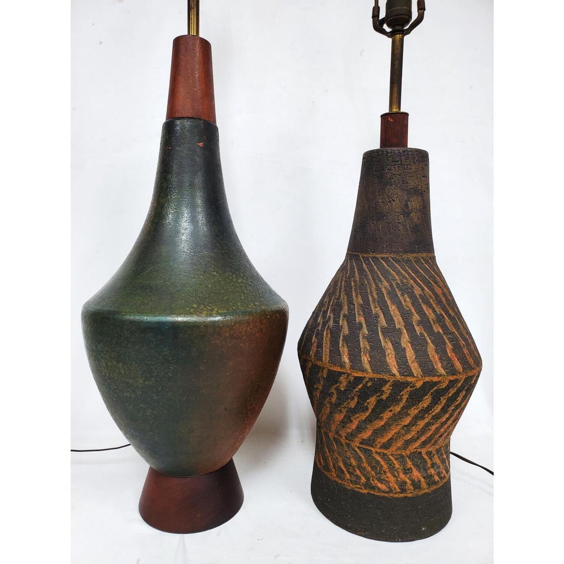 Lot of 2 Vintage Arts & Crafts Pottery Lamps: Lot of 2 Vintage Arts & Crafts Pottery Lamps. Condition: One Lamp is Generally Good. The Other Has an Old Repair. Dimensions: Larger- Total H-44" x Dia-12". Provenance: From a Long Island, NY Home. Pl