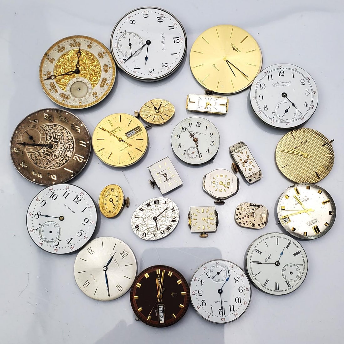 Lot of 23 Old Watch Movements: Lot of 23 Old Watch Movements. Including Waltham, Elgin & Others. Condition: Generally Good. Please Note- We Do Not Guarantee the Workability or Mechanism of Any Old Watches. Dimensions: Various Sizes