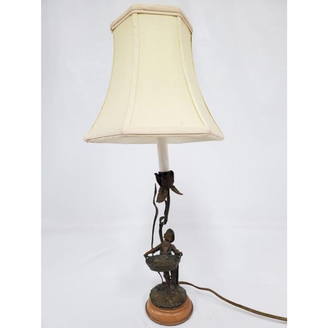 Old Austrian Metal Figural Candlestick Made Lamp: Old Austrian Metal Figural Candlestick Made Into a Lamp. Condition: Excellent. Dimensions: Total H-20.5" x Dia of Shade-8.5". Provenance: From a Long Island, NY Home. Please note the absence of a Cond