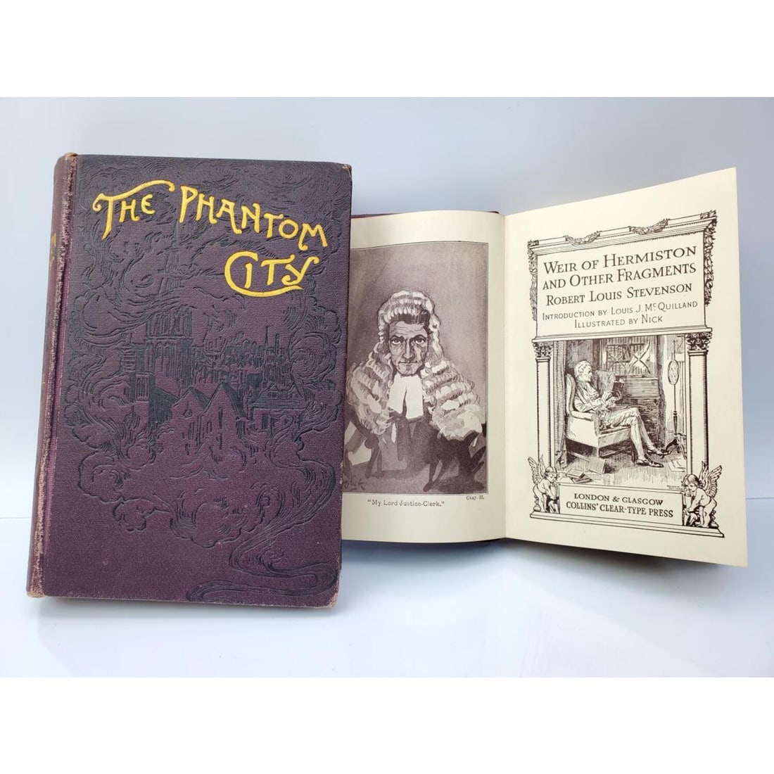 Lot of 2 Books Including "The Phantom City": Lot of 2 Books Including "Weir of Hermiston and Other Fragments" by Robert Louis Stevenson and "The Phantom City" by William Westall. Condition: Both are Generally Good. Dimensions: Larger Book L-7.5"