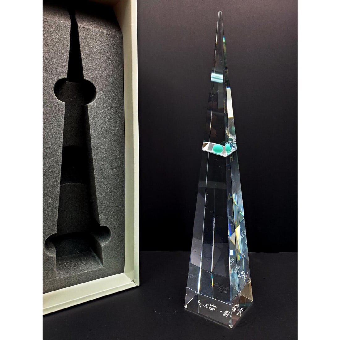 Swarovski Crystal Limited Edition 1997 Hong Kong: Swarovski Crystal Limited Edition 1997 "Hong Kong Crystal" Obelisk. In Original Fitted Box w/ Certificate of Authenticity. Condition: Excellent. Dimensions: H-12". Box-14.25" x 5.25" x 5.25". Provenan