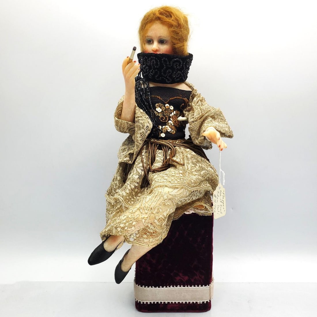 Edna Dali "Flapper" One of a Kind Doll: Edna Dali "Flapper" One of a Kind Doll w/ Original Velvet Stand. Retail Price for This Doll is $4,700. Comes w/ Original Condition: Generally Very Good. Dimensions: Total H-15" Including Stand. Proven