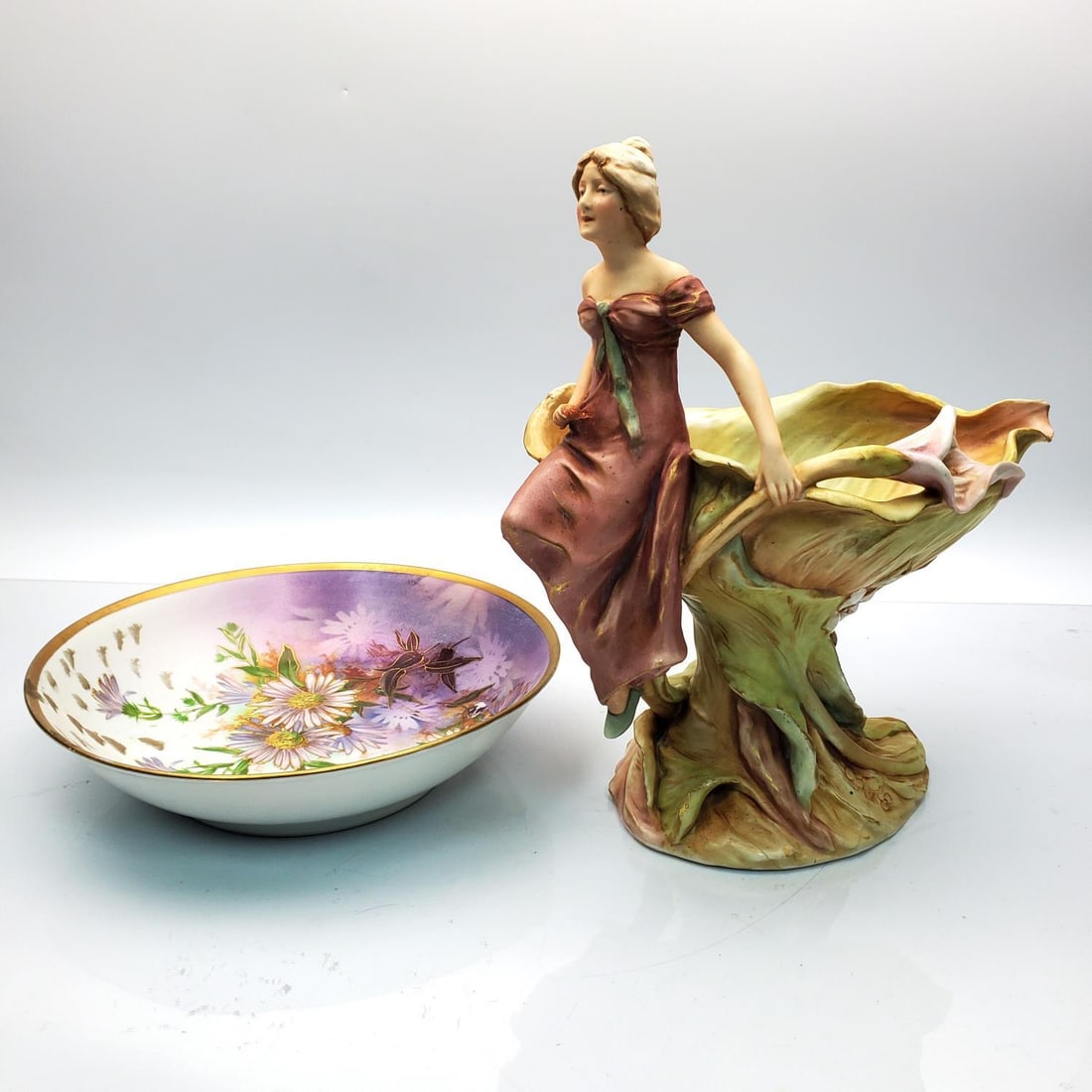 Lot of 2 Art Nouveau Austrian Porcelain Items: Lot of 2 Art Nouveau Austrian Porcelain Items Including 1 by Turnteplitz and 1 by Royal Dux. Condition: Royal Dux Has an Old Hairline at The Bottom. Both are Sold As Is. Dimensions: Largest H-11.5" x