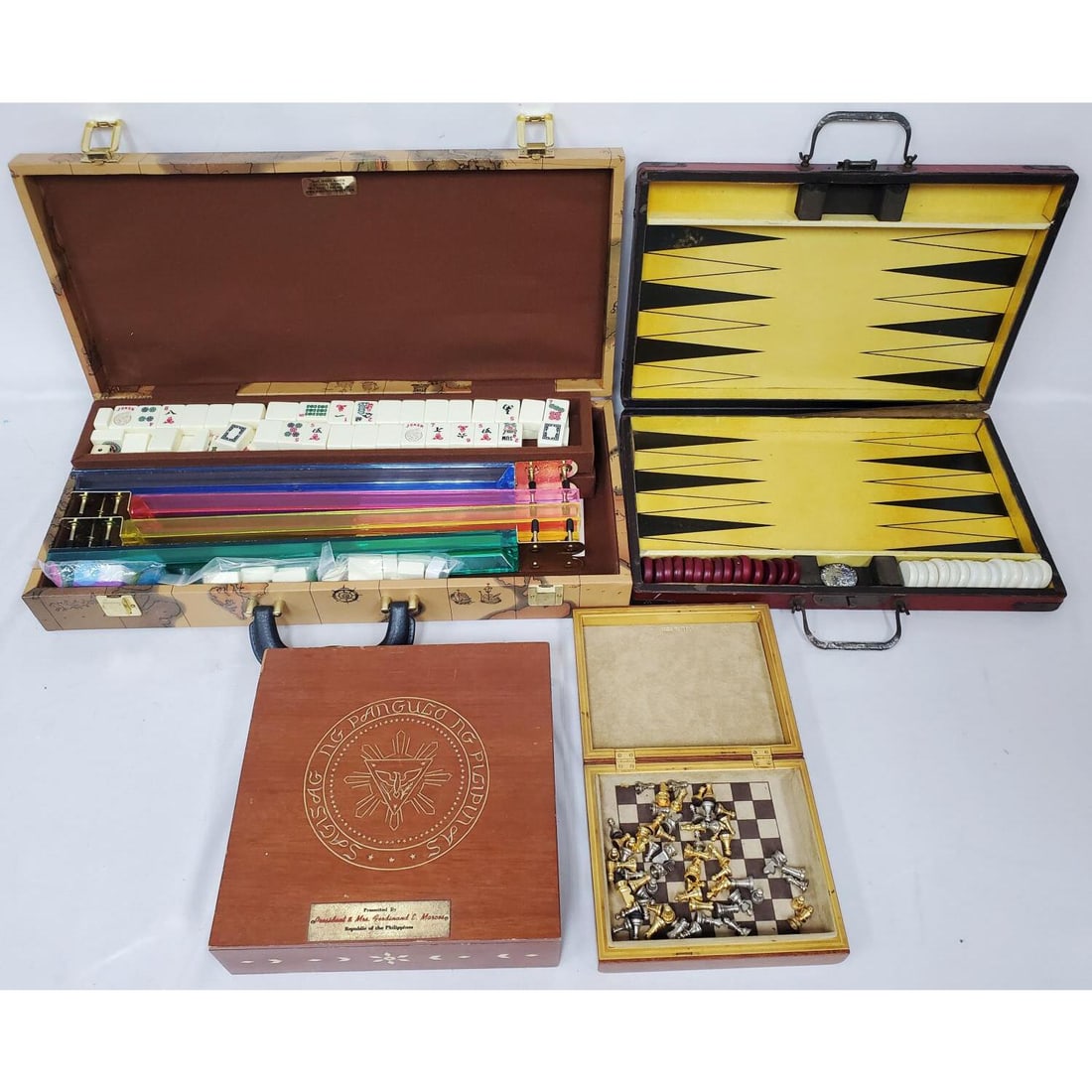 Lot of 3 Vintage Game Sets: Lot of 3 Vintage Game Sets Including Mahjong, Backgammon & Chess In Original Cases. Condition: Generally Good. AS FOUND. Sold As Is. Dimensions: Largest-20.5" x 9.25" x 3.25". Provenance: From a Long