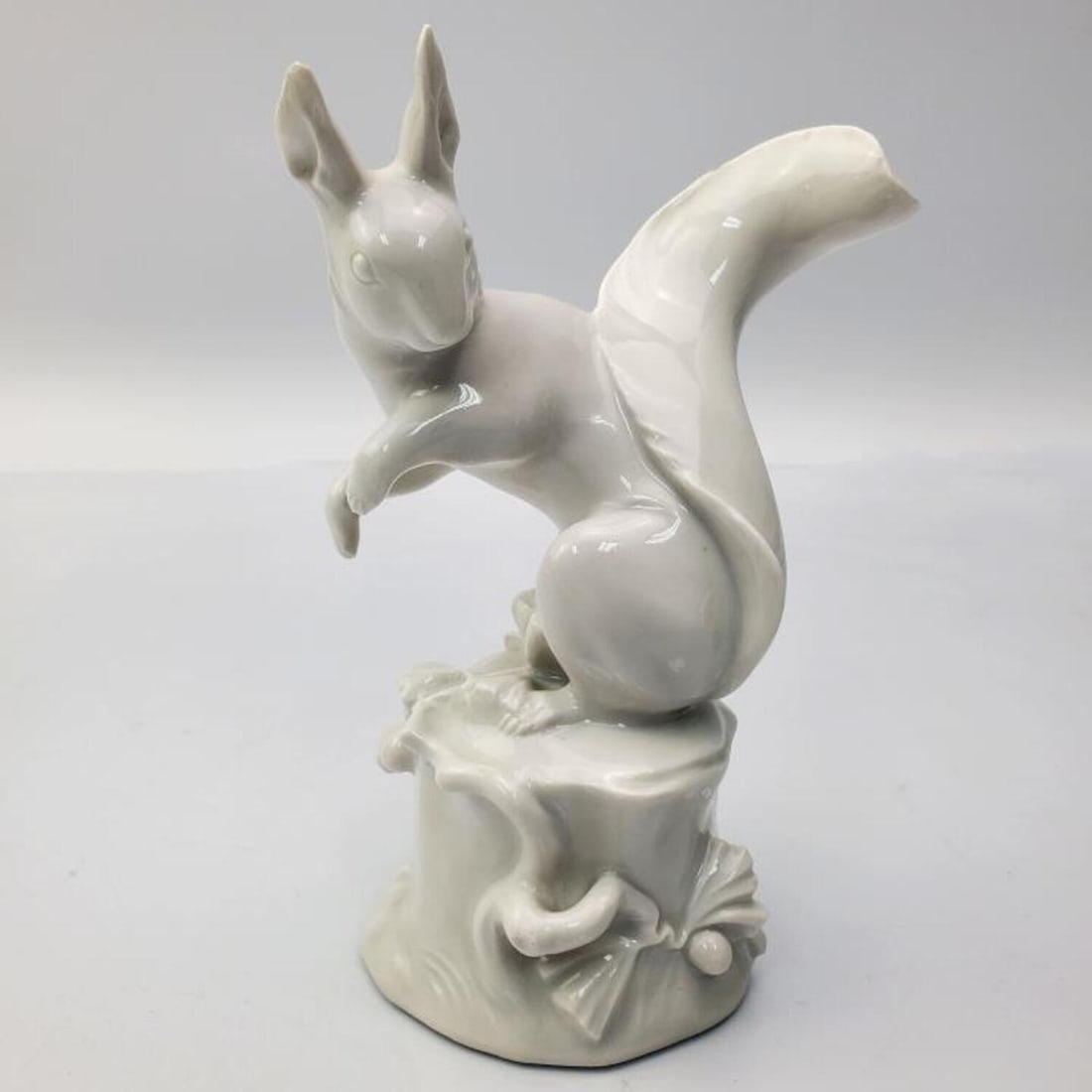 Meissen White Glazed Figure of a Squirrel: Meissen White Glazed Figure of a Squirrel. Fully Marked. Condition: Generally Very Good w/ a Tiny Chip on the Tail. Dimensions: H-5.5" x L-3.75". Provenance: From a Private New Jersey Home. Please not