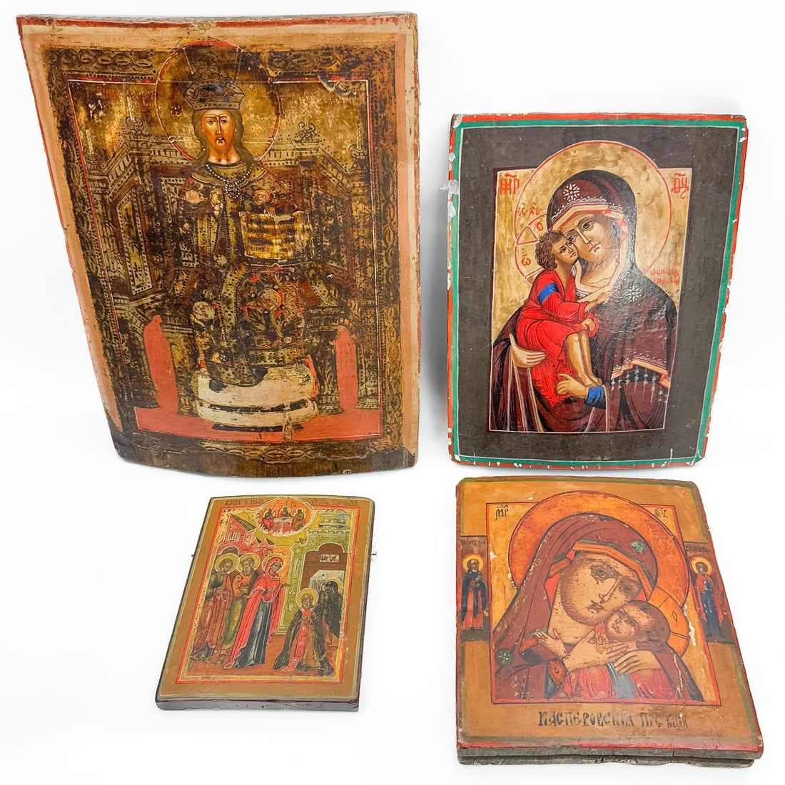 Lot of 4 Antique Russian Wooden Icons: Lot of 4 Antique Russian Wooden Icons. Depictions Include: 2 "Madonna and Child" Examples, 1 "Appearance of the Mother of God to Saint Sergiy of Radonezh" & 1 of "Saint Nicholas". Condition: Generally