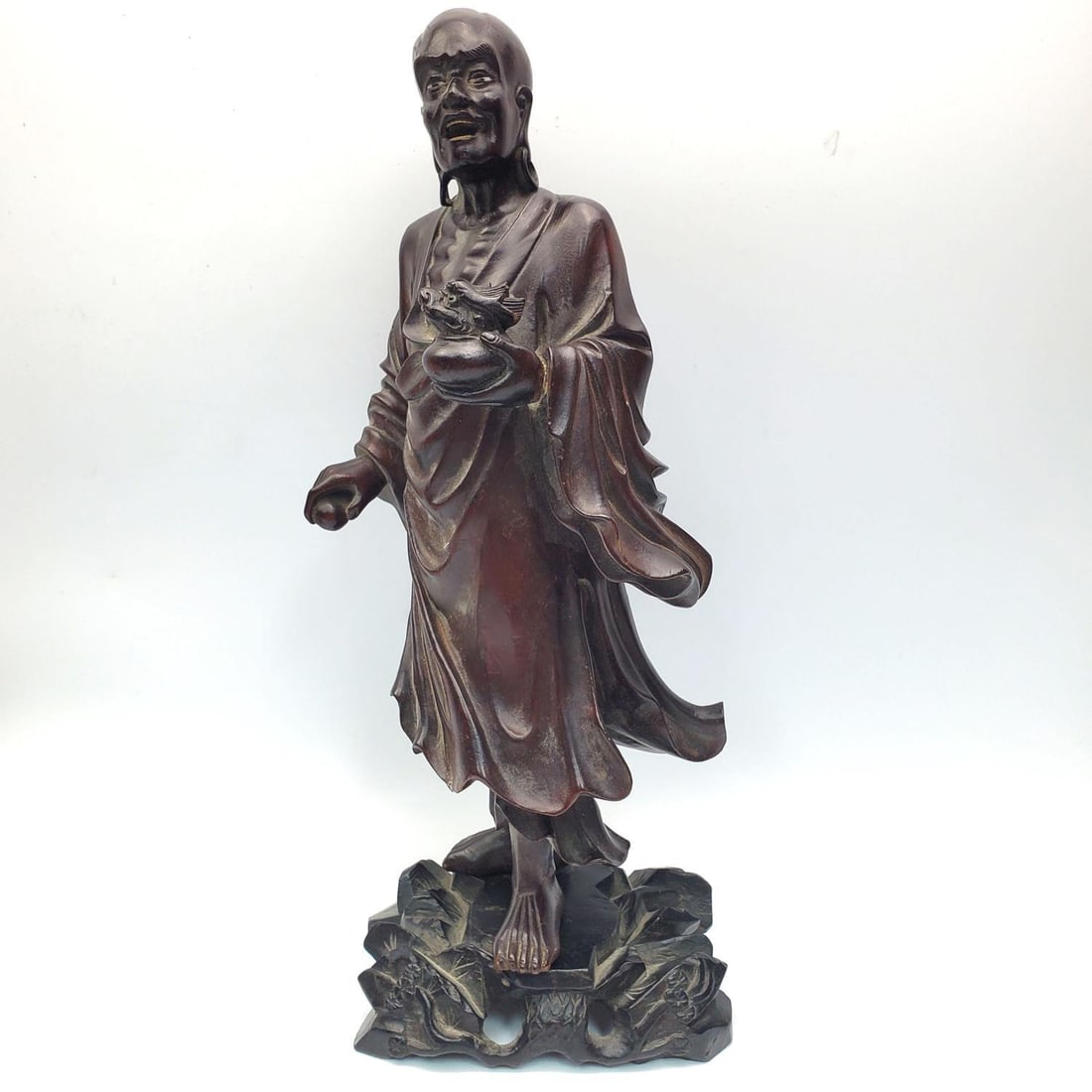 Fine Antique Japanese Carved Wood Buddhist Figure: Very Fine Antique Japanese Carved Wood Figure of Buddhist Figure. On Original Carved Wood Base. Condition: Generally Very Good. Dimensions: Total H-13.5". Provenance: From a Long Island, NY Home. Plea