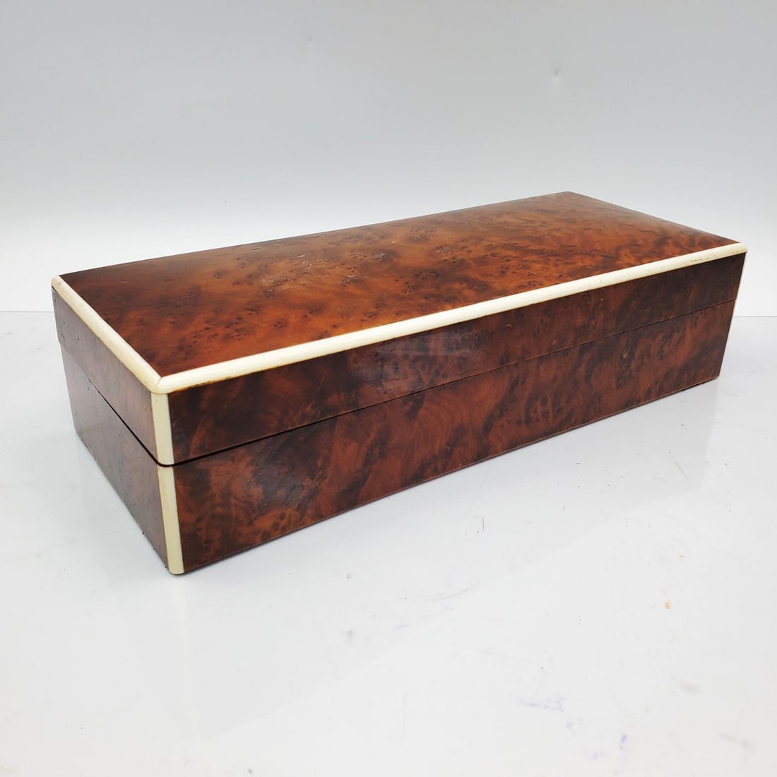Vintage Burr Wood Glove Box: Vintage Burr Wood Glove Box.Condition: Generally Very Good. Dimensions: L-9.75" x W-4" x H-2.5".Provenance: From the Estate of an Important Private Long Island, NY Collector. Collected Over Several De